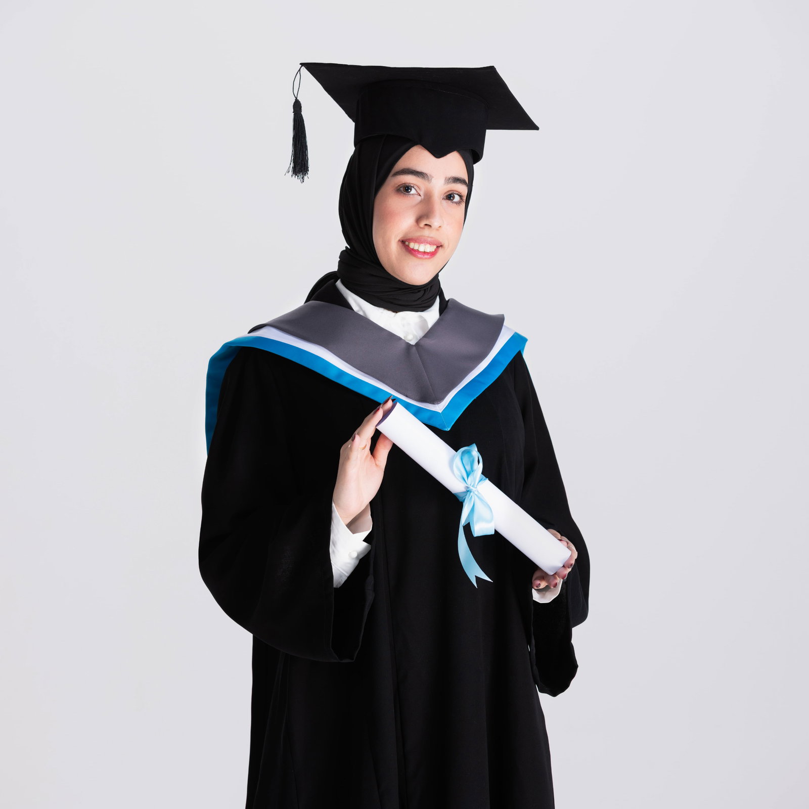 young-graduate-student-making-thumbs-up-white